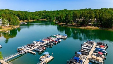 Discover the allure of this newly updated Captains Walk condo SOL on Keowee Key Golf and Country Club in South Carolina - for sale on GolfHomes.com, golf home, golf lot