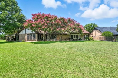 Elegant English Tudor nestled on an oversized lot in the on Walnut Creek Country Club in Texas - for sale on GolfHomes.com, golf home, golf lot