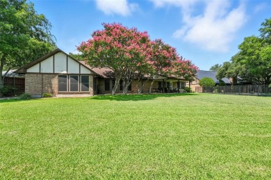 Elegant English Tudor nestled on an oversized lot in the on Walnut Creek Country Club in Texas - for sale on GolfHomes.com, golf home, golf lot