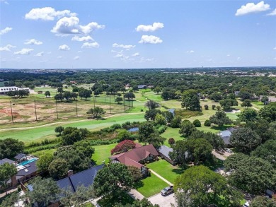 Elegant English Tudor nestled on an oversized lot in the on Walnut Creek Country Club in Texas - for sale on GolfHomes.com, golf home, golf lot