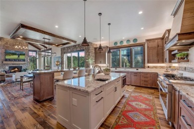 Welcome to 329 Raven Golf Lane, an exceptional mountain retreat on Raven Golf Club At Three Peaks in Colorado - for sale on GolfHomes.com, golf home, golf lot
