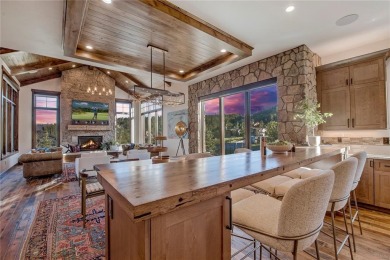 Welcome to 329 Raven Golf Lane, an exceptional mountain retreat on Raven Golf Club At Three Peaks in Colorado - for sale on GolfHomes.com, golf home, golf lot