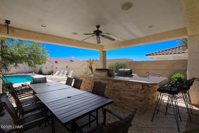 Two properties in one! You need to see this place in person on London Bridge Golf Course in Arizona - for sale on GolfHomes.com, golf home, golf lot