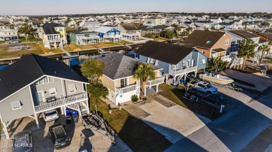 Canal front! Completely furnished and move in ready. Fall in on Sea Trail Golf Resort in North Carolina - for sale on GolfHomes.com, golf home, golf lot