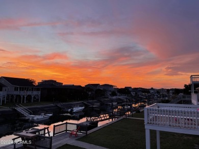 Canal front! Completely furnished and move in ready. Fall in on Sea Trail Golf Resort in North Carolina - for sale on GolfHomes.com, golf home, golf lot