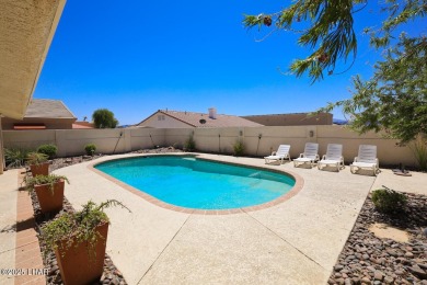 Two properties in one! You need to see this place in person on London Bridge Golf Course in Arizona - for sale on GolfHomes.com, golf home, golf lot