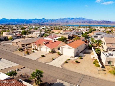 Two properties in one! You need to see this place in person on London Bridge Golf Course in Arizona - for sale on GolfHomes.com, golf home, golf lot
