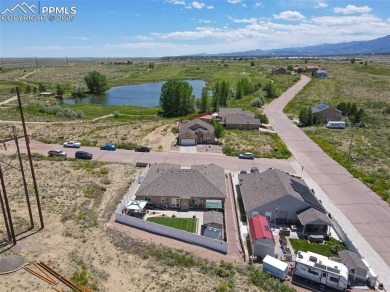 Welcome to Relaxed Ranch-Style Living with Modern Comfort Hey on Sumo Golf Village in Colorado - for sale on GolfHomes.com, golf home, golf lot