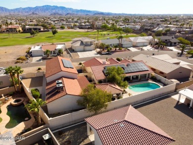 Two properties in one! You need to see this place in person on London Bridge Golf Course in Arizona - for sale on GolfHomes.com, golf home, golf lot