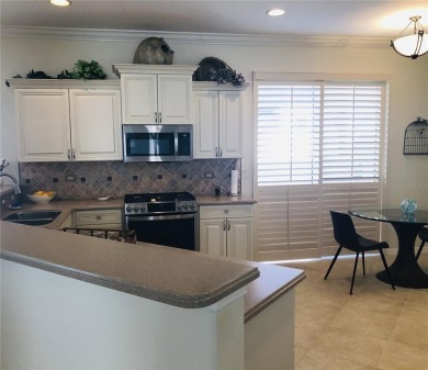 Experience the ideal Florida lifestyle in this impeccable on Venetian Golf and River Club in Florida - for sale on GolfHomes.com, golf home, golf lot