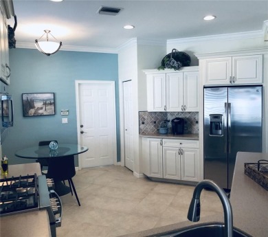 Experience the ideal Florida lifestyle in this impeccable on Venetian Golf and River Club in Florida - for sale on GolfHomes.com, golf home, golf lot
