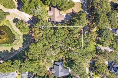 Perfect location to build your coastal home.  Level lot with on Oyster Bay Golf Links in North Carolina - for sale on GolfHomes.com, golf home, golf lot