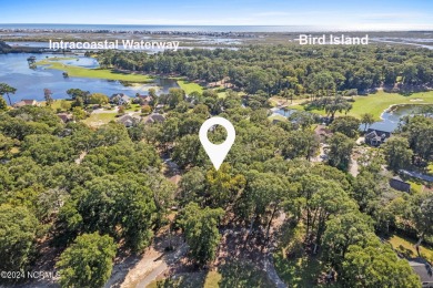 Perfect location to build your coastal home.  Level lot with on Oyster Bay Golf Links in North Carolina - for sale on GolfHomes.com, golf home, golf lot