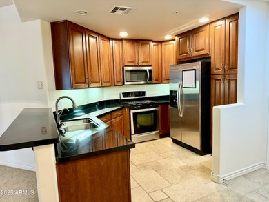 This move-in-ready residence offers refined resort-style living on Wildfire Golf Club in Arizona - for sale on GolfHomes.com, golf home, golf lot