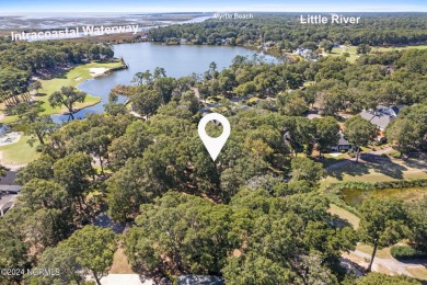 Perfect location to build your coastal home.  Level lot with on Oyster Bay Golf Links in North Carolina - for sale on GolfHomes.com, golf home, golf lot