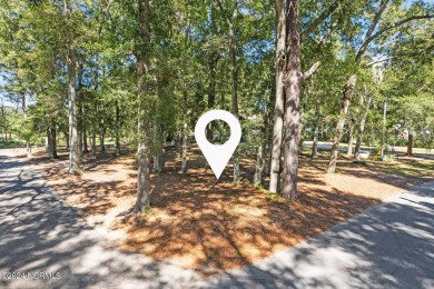 Perfect location to build your coastal home.  Level lot with on Oyster Bay Golf Links in North Carolina - for sale on GolfHomes.com, golf home, golf lot