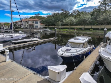 Beautifully FURNISHED 2 bedroom 2 1/2 bath condominium with 50' on Pablo Creek Club in Florida - for sale on GolfHomes.com, golf home, golf lot