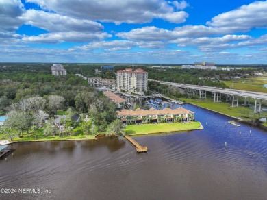 Beautifully FURNISHED 2 bedroom 2 1/2 bath condominium with 50' on Pablo Creek Club in Florida - for sale on GolfHomes.com, golf home, golf lot