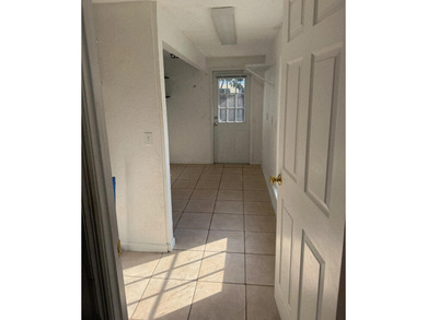 Welcome to this charming Florida Bungalow with tons of natural on West Palm Beach Golf Course in Florida - for sale on GolfHomes.com, golf home, golf lot