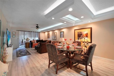 RARELY AVAILABLE PORTOFINO MODEL - 1ST FLOOR UNIT IN COVETED on Sunrise Lakes Phase III in Florida - for sale on GolfHomes.com, golf home, golf lot