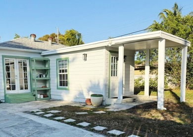 Welcome to this charming Florida Bungalow with tons of natural on West Palm Beach Golf Course in Florida - for sale on GolfHomes.com, golf home, golf lot