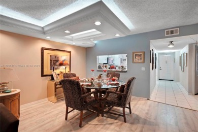 RARELY AVAILABLE PORTOFINO MODEL - 1ST FLOOR UNIT IN COVETED on Sunrise Lakes Phase III in Florida - for sale on GolfHomes.com, golf home, golf lot