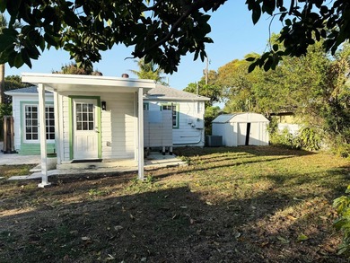 Welcome to this charming Florida Bungalow with tons of natural on West Palm Beach Golf Course in Florida - for sale on GolfHomes.com, golf home, golf lot