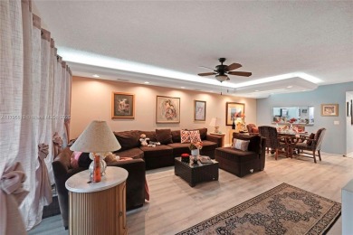 RARELY AVAILABLE PORTOFINO MODEL - 1ST FLOOR UNIT IN COVETED on Sunrise Lakes Phase III in Florida - for sale on GolfHomes.com, golf home, golf lot