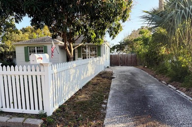Welcome to this charming Florida Bungalow with tons of natural on West Palm Beach Golf Course in Florida - for sale on GolfHomes.com, golf home, golf lot