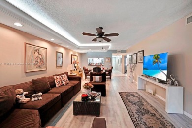 RARELY AVAILABLE PORTOFINO MODEL - 1ST FLOOR UNIT IN COVETED on Sunrise Lakes Phase III in Florida - for sale on GolfHomes.com, golf home, golf lot