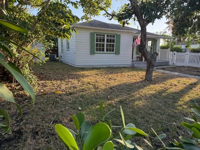 Welcome to this charming Florida Bungalow with tons of natural on West Palm Beach Golf Course in Florida - for sale on GolfHomes.com, golf home, golf lot