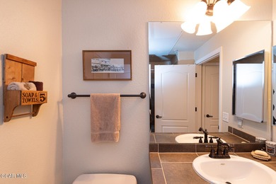 This bright and inviting mountain condo offers a spacious on Headwaters Golf Course At Granby Ranch in Colorado - for sale on GolfHomes.com, golf home, golf lot