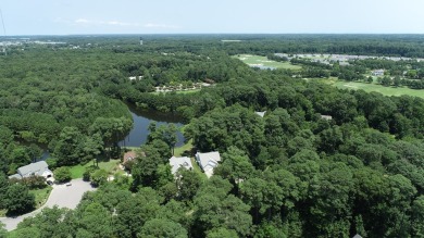 Exquisite corner lot nestled in front of a wooded area making on Bay Creek Golf Club in Virginia - for sale on GolfHomes.com, golf home, golf lot