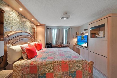 RARELY AVAILABLE PORTOFINO MODEL - 1ST FLOOR UNIT IN COVETED on Sunrise Lakes Phase III in Florida - for sale on GolfHomes.com, golf home, golf lot