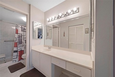 RARELY AVAILABLE PORTOFINO MODEL - 1ST FLOOR UNIT IN COVETED on Sunrise Lakes Phase III in Florida - for sale on GolfHomes.com, golf home, golf lot