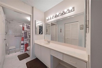 RARELY AVAILABLE PORTOFINO MODEL - 1ST FLOOR UNIT IN COVETED on Sunrise Lakes Phase III in Florida - for sale on GolfHomes.com, golf home, golf lot