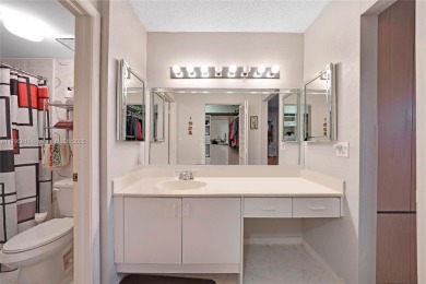 RARELY AVAILABLE PORTOFINO MODEL - 1ST FLOOR UNIT IN COVETED on Sunrise Lakes Phase III in Florida - for sale on GolfHomes.com, golf home, golf lot