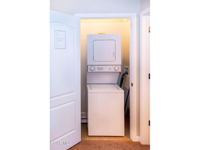 This bright, well-designed mountain condo offers comfort on Headwaters Golf Course At Granby Ranch in Colorado - for sale on GolfHomes.com, golf home, golf lot