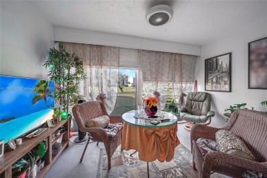 RARELY AVAILABLE PORTOFINO MODEL - 1ST FLOOR UNIT IN COVETED on Sunrise Lakes Phase III in Florida - for sale on GolfHomes.com, golf home, golf lot