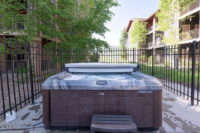 This bright, well-designed mountain condo offers comfort on Headwaters Golf Course At Granby Ranch in Colorado - for sale on GolfHomes.com, golf home, golf lot