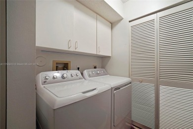 RARELY AVAILABLE PORTOFINO MODEL - 1ST FLOOR UNIT IN COVETED on Sunrise Lakes Phase III in Florida - for sale on GolfHomes.com, golf home, golf lot