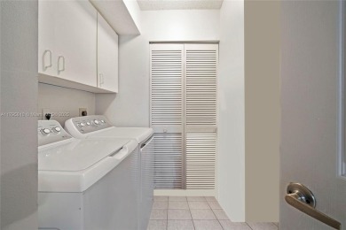 RARELY AVAILABLE PORTOFINO MODEL - 1ST FLOOR UNIT IN COVETED on Sunrise Lakes Phase III in Florida - for sale on GolfHomes.com, golf home, golf lot