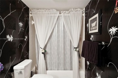 RARELY AVAILABLE PORTOFINO MODEL - 1ST FLOOR UNIT IN COVETED on Sunrise Lakes Phase III in Florida - for sale on GolfHomes.com, golf home, golf lot