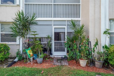 RARELY AVAILABLE PORTOFINO MODEL - 1ST FLOOR UNIT IN COVETED on Sunrise Lakes Phase III in Florida - for sale on GolfHomes.com, golf home, golf lot