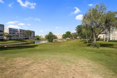 RARELY AVAILABLE PORTOFINO MODEL - 1ST FLOOR UNIT IN COVETED on Sunrise Lakes Phase III in Florida - for sale on GolfHomes.com, golf home, golf lot