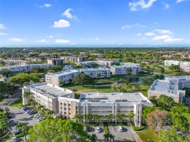 RARELY AVAILABLE PORTOFINO MODEL - 1ST FLOOR UNIT IN COVETED on Sunrise Lakes Phase III in Florida - for sale on GolfHomes.com, golf home, golf lot