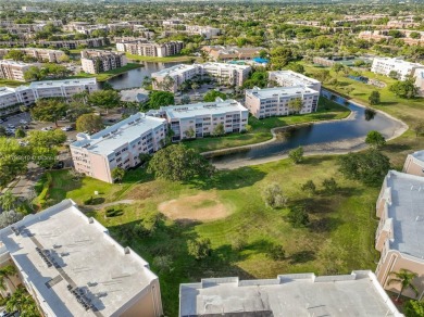 RARELY AVAILABLE PORTOFINO MODEL - 1ST FLOOR UNIT IN COVETED on Sunrise Lakes Phase III in Florida - for sale on GolfHomes.com, golf home, golf lot
