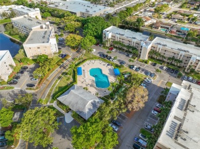 RARELY AVAILABLE PORTOFINO MODEL - 1ST FLOOR UNIT IN COVETED on Sunrise Lakes Phase III in Florida - for sale on GolfHomes.com, golf home, golf lot