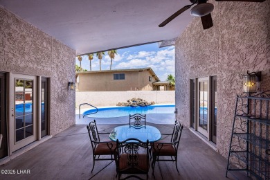 Welcome to 2475 Saratoga located on a premium corner lot, this on London Bridge Golf Course in Arizona - for sale on GolfHomes.com, golf home, golf lot