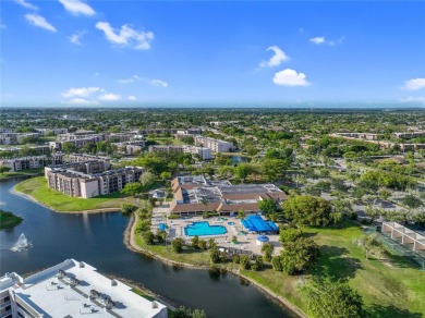 RARELY AVAILABLE PORTOFINO MODEL - 1ST FLOOR UNIT IN COVETED on Sunrise Lakes Phase III in Florida - for sale on GolfHomes.com, golf home, golf lot